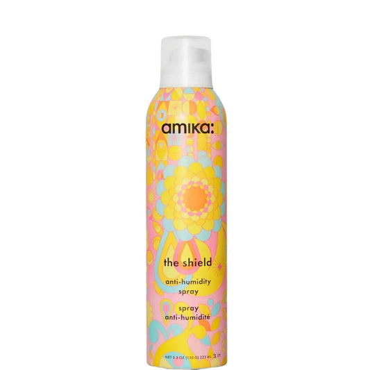 Amika anti-humidity spray bottle with colorful label on a white background