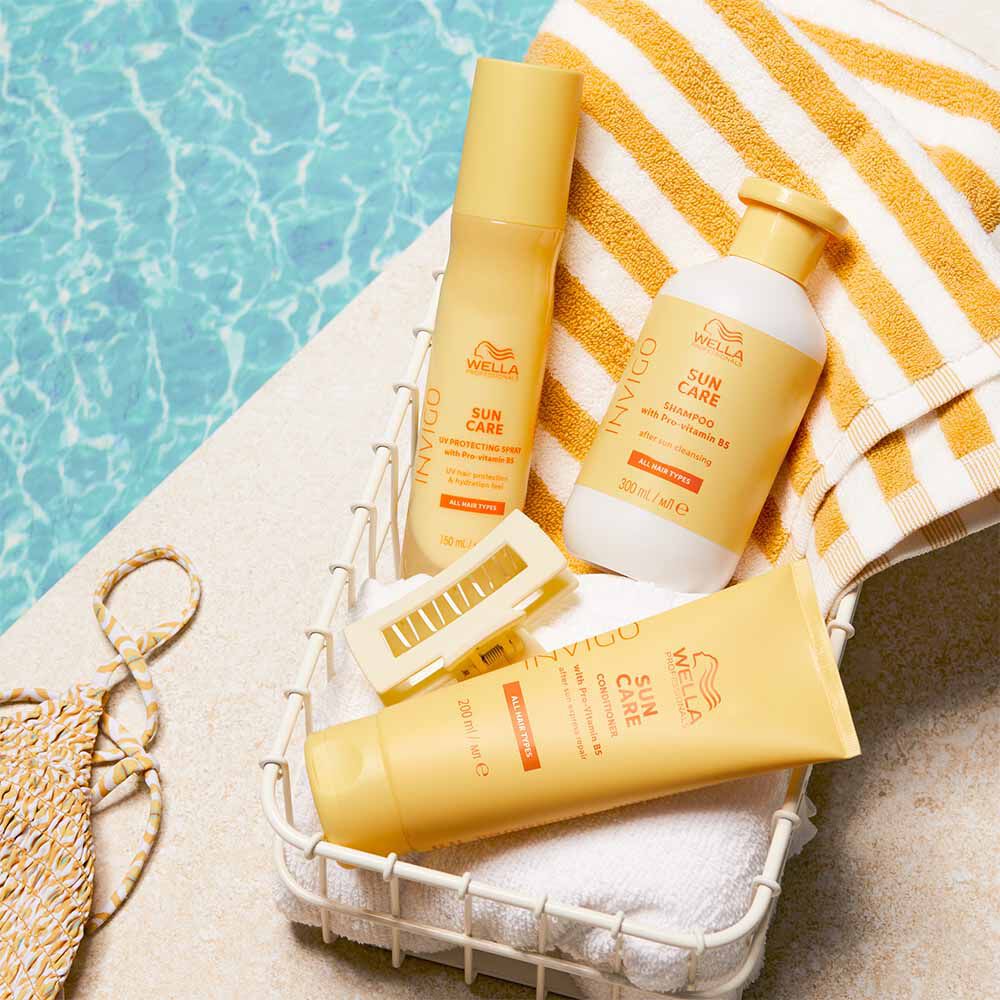 Wella Professionals Invigo Sun Product Lineup in a Basket By the Poolside